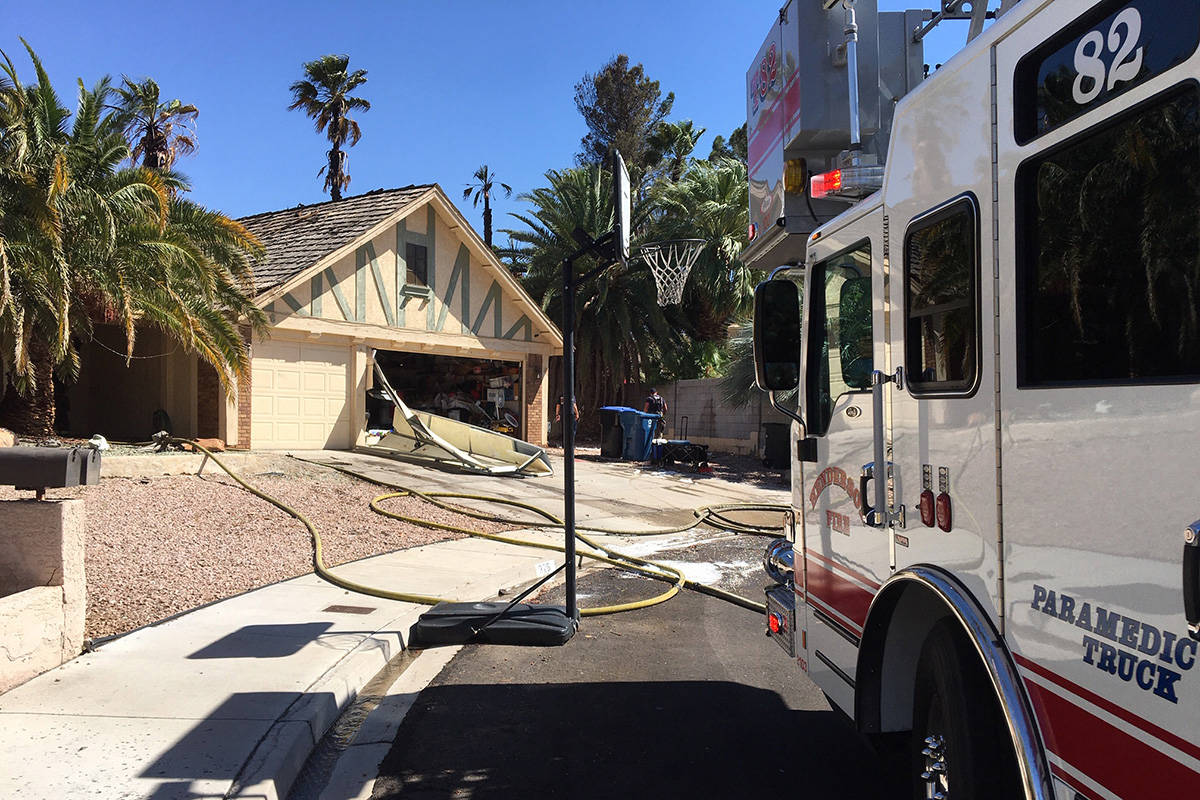 Crews battle a fire Thursday, April 30, 2020, on the 300 block of Fuente Drive in Henderson. (M ...