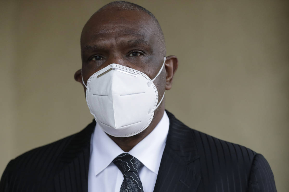 Baseball Hall of Famer Andre Dawson poses for a photo at his funeral business, Paradise Memoria ...