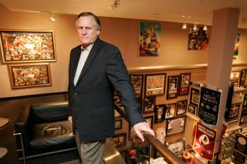 Sam Battistone stands in his Field of Dreams sports memorabilia store at the Forum Shops in Cae ...