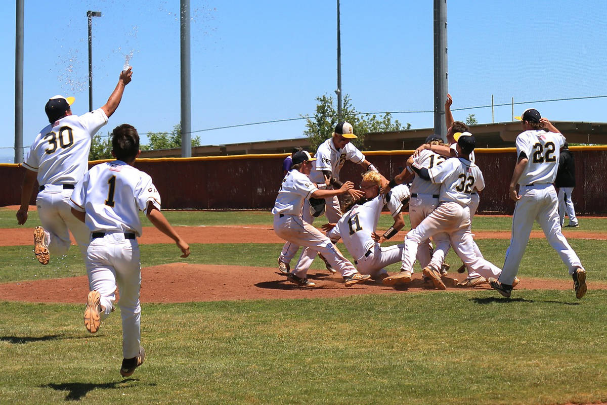 Laura Hubel/Boulder City Review Members of Boulder City High School's baseball team celebrate w ...