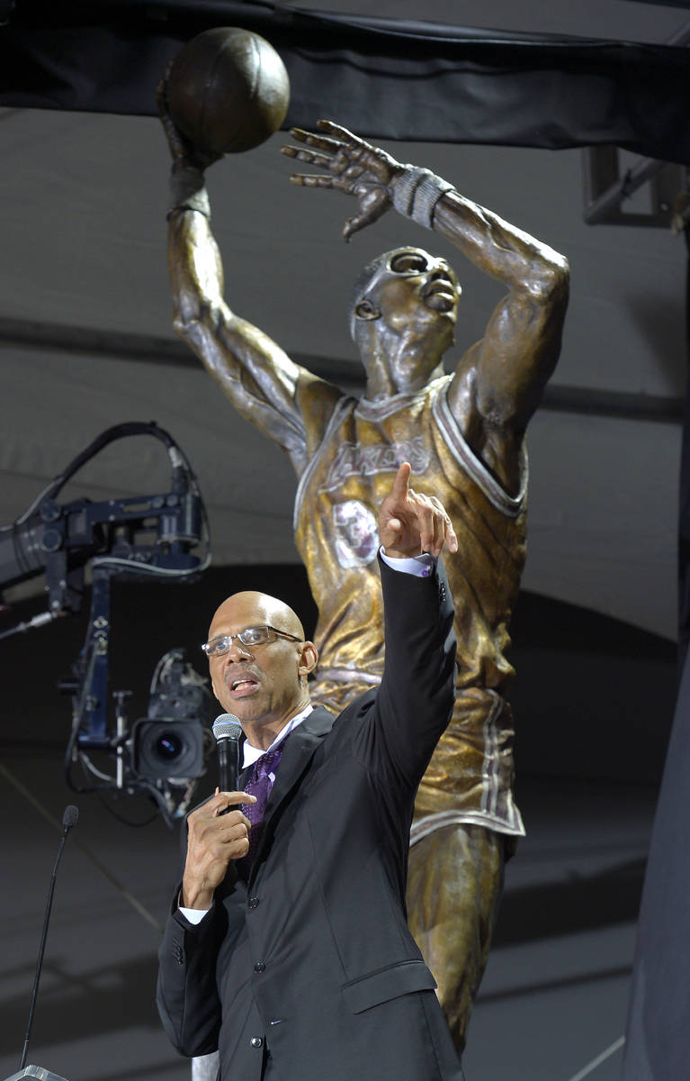 Former Los Angeles Lakers center Kareem Abdul-Jabbar speaks after unveiling a statue of himself ...