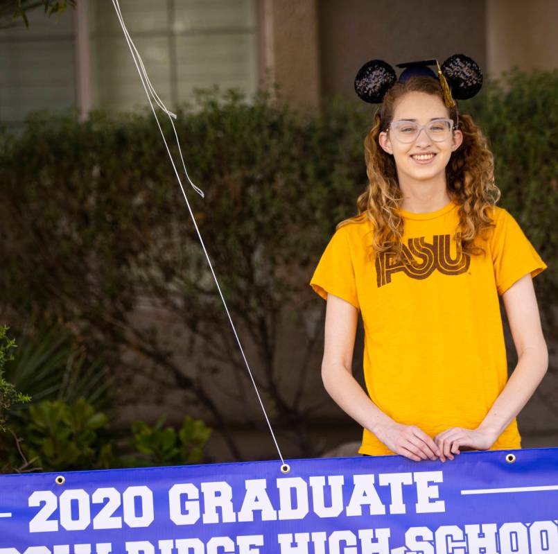 Isabella Rowles, a senior graduating from Shadow Ridge High School, poses for a portrait outsid ...