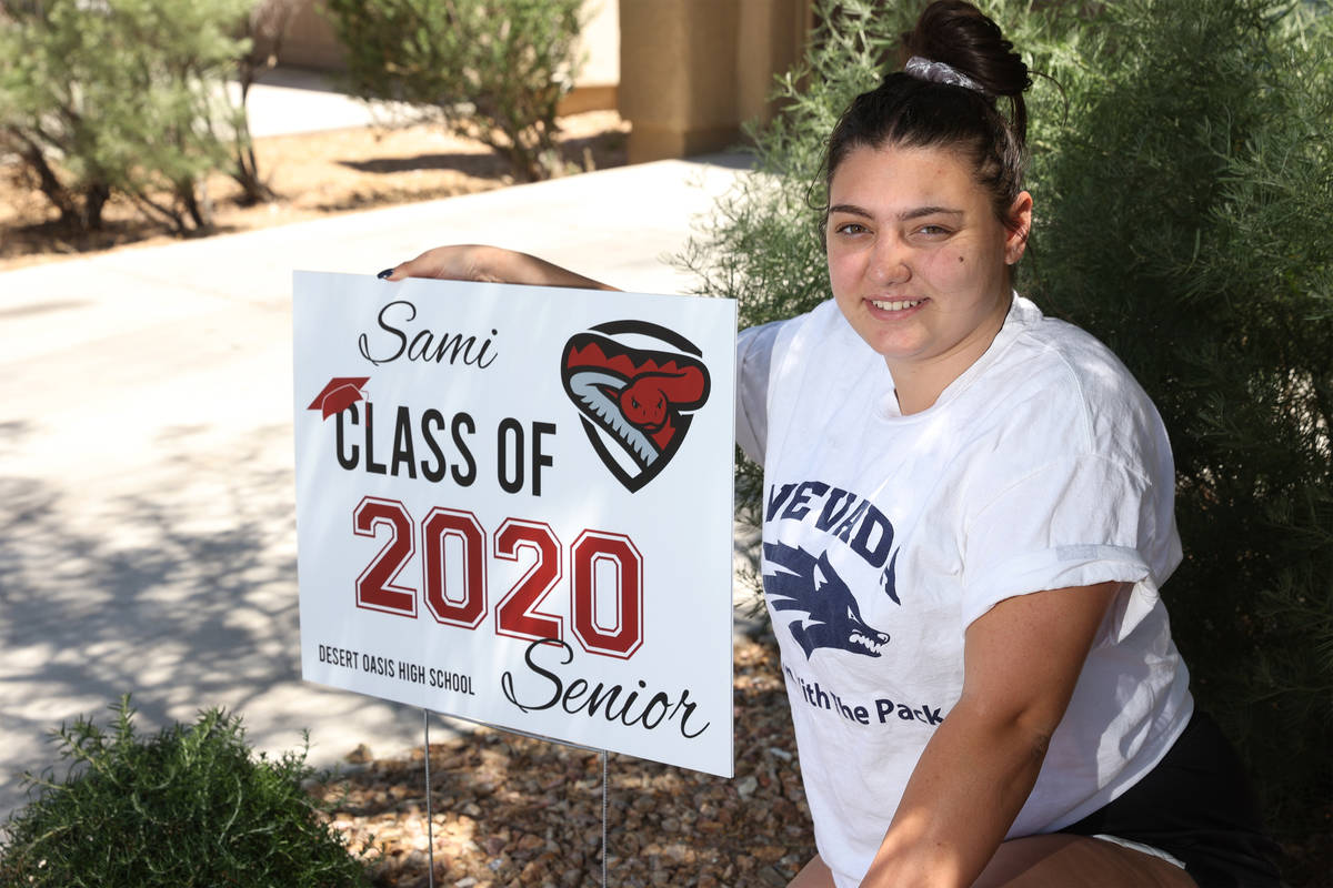 Desert Oasis High School senior Samantha Gato, 18, poses in front of a yard sign at her Las Veg ...