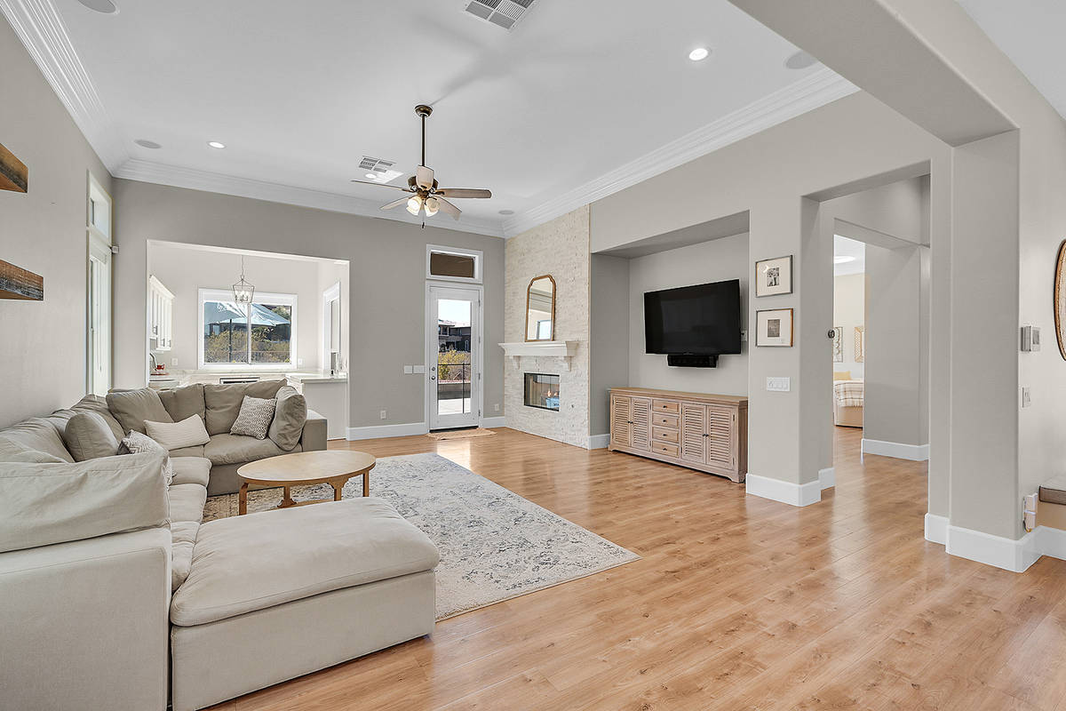 A neutral gray paint adorns the walls. (Huntington & Ellis)