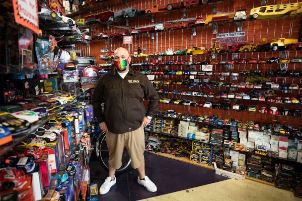 Johnny Jimenez Jr., owner of Toy Shack, stands for a portrait in his store in the Neonopolis sh ...