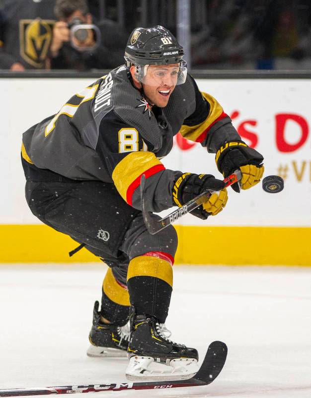 Vegas Golden Knights center Jonathan Marchessault (81) knocks down a puck near the Calgary Flam ...