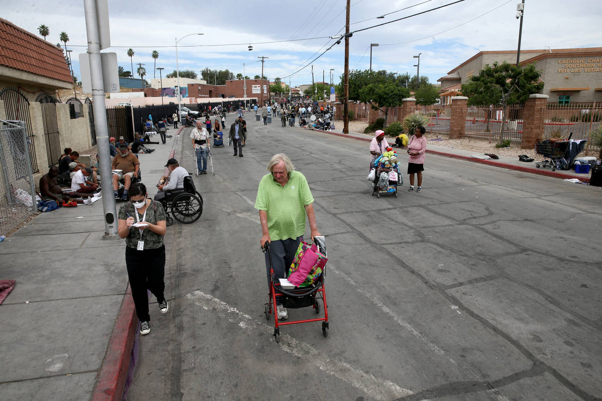 Robert Godleski, 73, makes his way down Foremaster Lane near Las Vegas Boulevard in downtown La ...