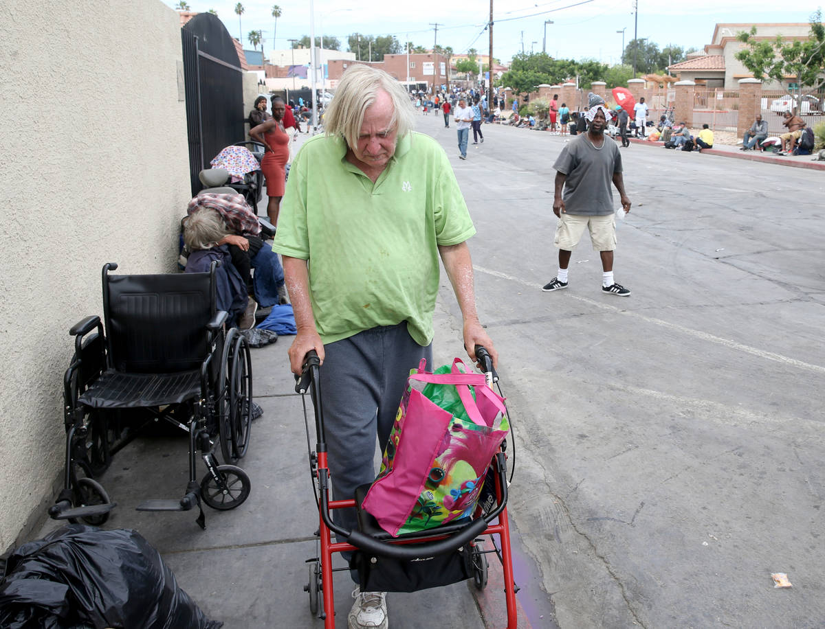 Robert Godleski, 73, makes his way down Foremaster Lane near Las Vegas Boulevard in downtown La ...