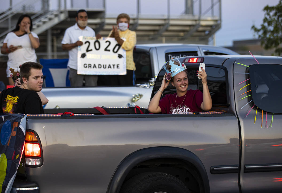 Desert Oasis High School students participate in a senior prom parade in Las Vegas on Friday, M ...