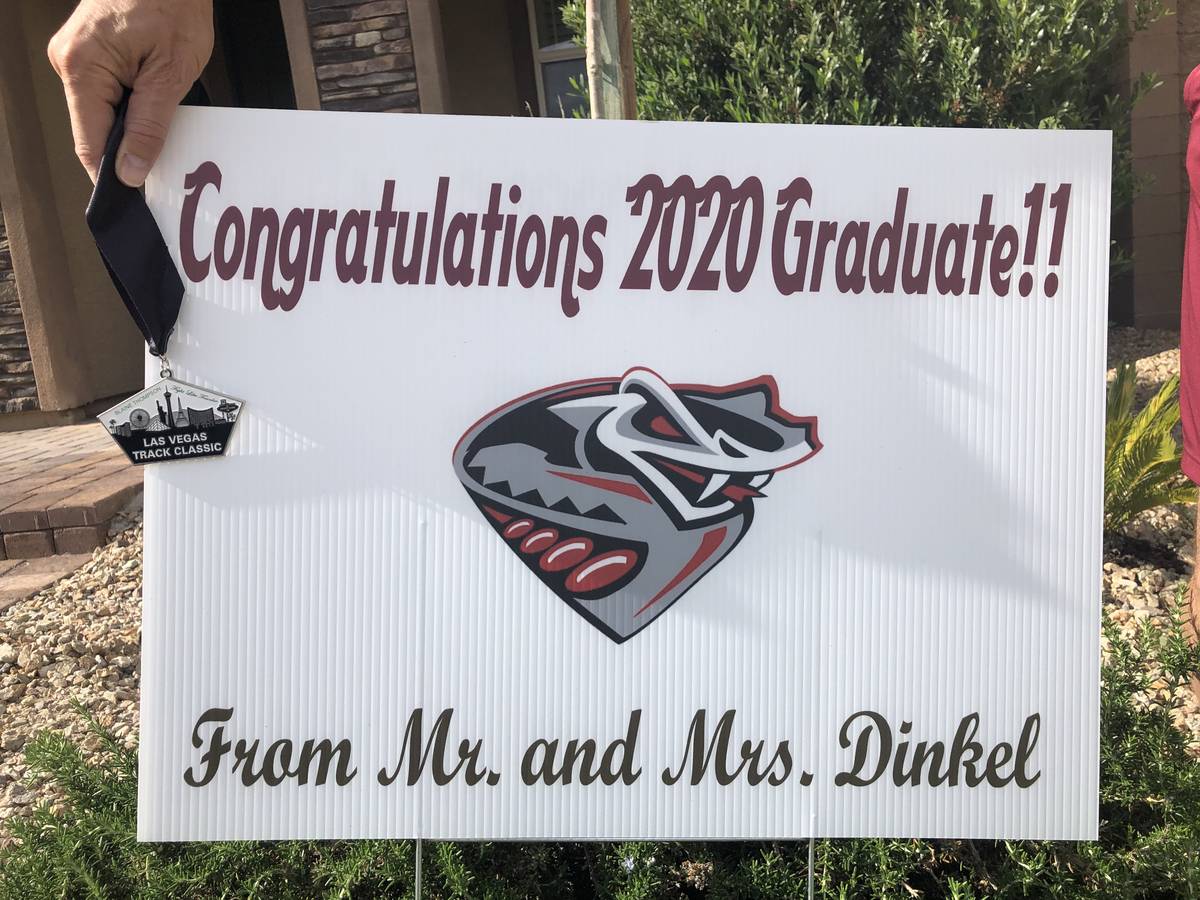 Desert Oasis coaches Jim and Cindy Dinkel had signs made up for each of the athletes for the co ...