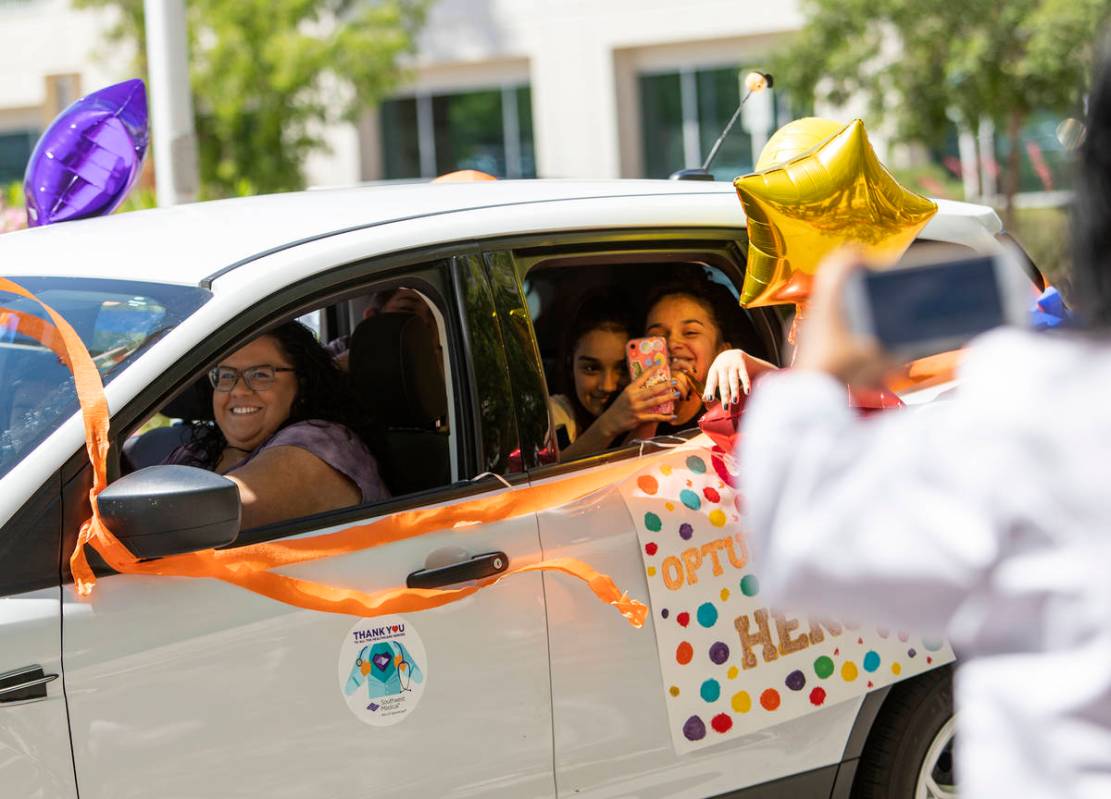 A vehicle drives through to thank Southwest Medical physicians and nurses for their frontline w ...