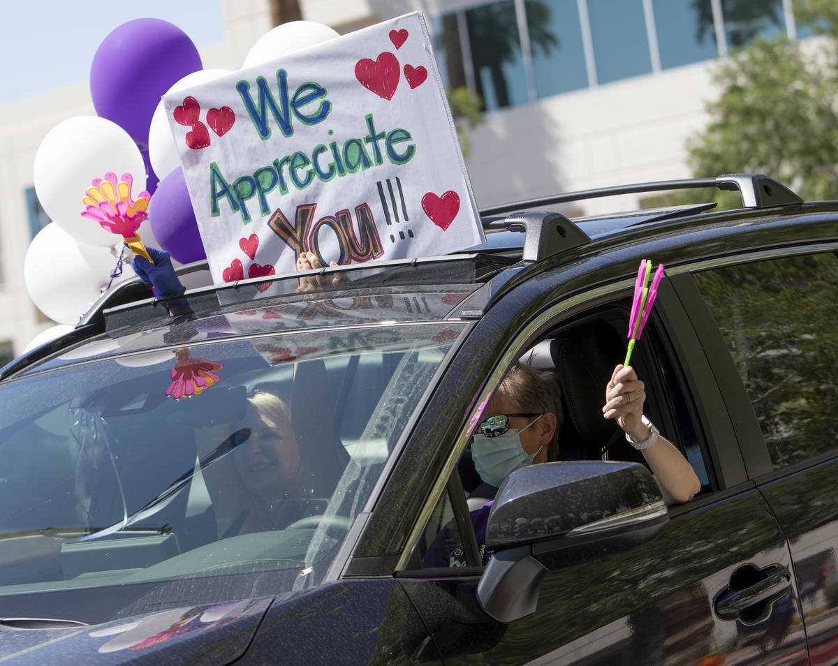 Vehicles drive through to thank Southwest Medical physicians and nurses for their frontline wor ...