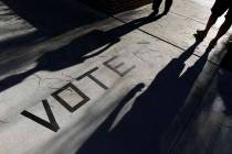 Voters head to the polls at the Enterprise Library in Las Vegas in this 2018 file photo. (AP P ...