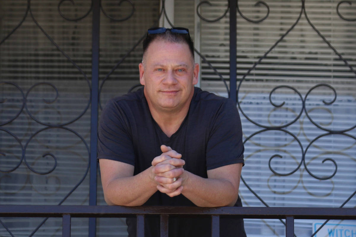 Alan Scialpi, former convention center employee, poses for a photo outside of his Las Vegas apa ...