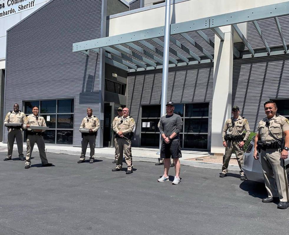 Cody Tomboli of Bar Code Burger donates meals to LVMPD Convention Center Area Command. Cody Tomboli