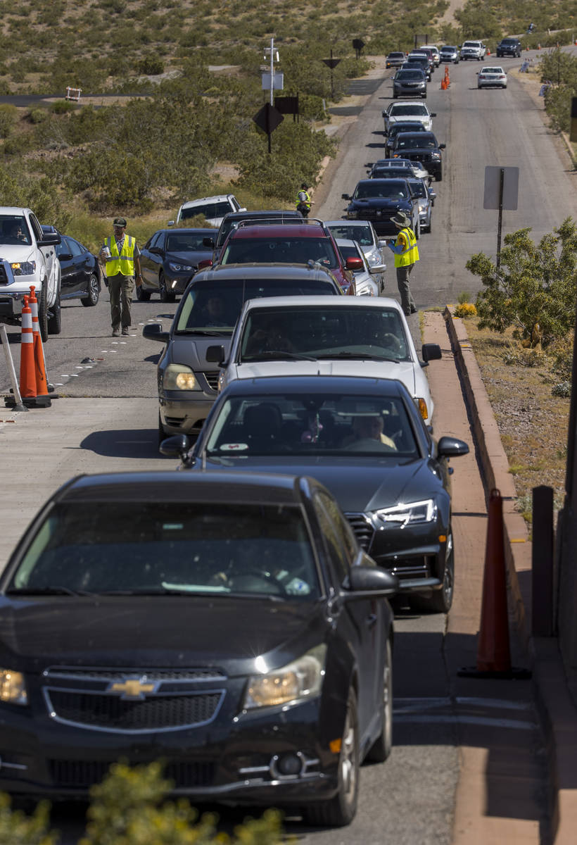 Visitors are backed up at a Lake Mead National Recreation Area access point which is now open t ...