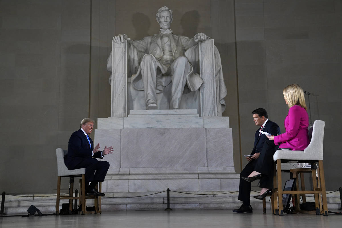 President Donald Trump speaks during a Fox News virtual town hall from the Lincoln Memorial, Su ...