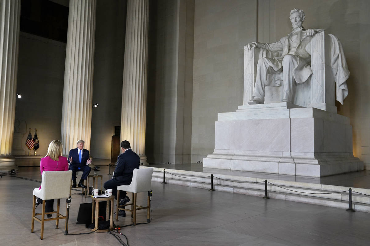 President Donald Trump speaks during a Fox News virtual town hall from the Lincoln Memorial, Su ...