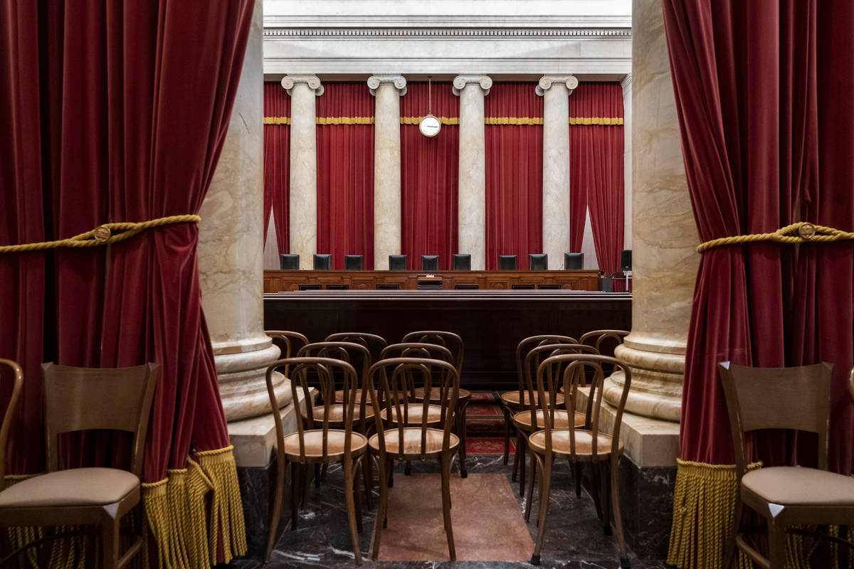 FILE - In this June 24, 2019 file photo, the empty courtroom is seen at the U.S. Supreme Court ...