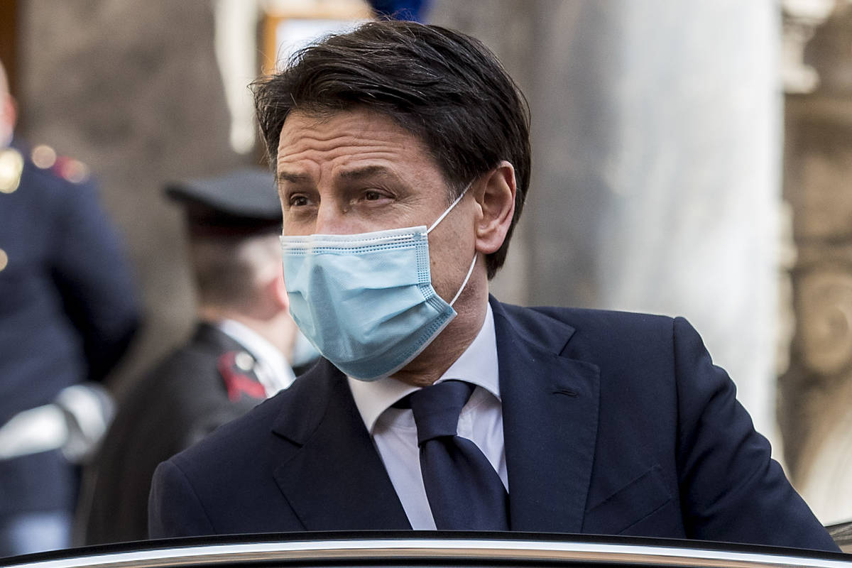 Italian Premier Giuseppe Conte leaves after addressing the Senate, in Rome, Thursday, April 30, ...