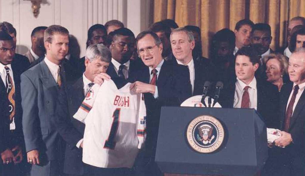 Carlos Huerta, second right, and his Miami Hurricanes teammates were invited to the White House ...