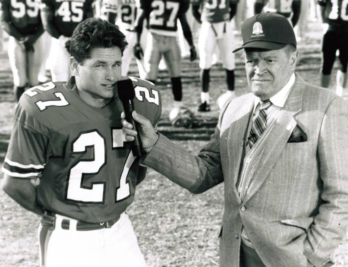 All-American kicker Carlos Huerta is interviewed by Bob Hope during the former's college career ...