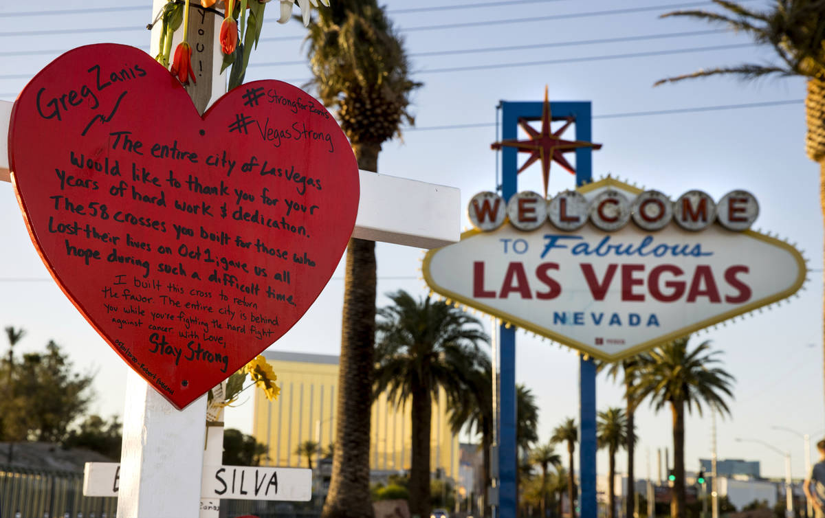 White crosses for Greg Zanis at the "Welcome to Fabulous Las Vegas" sign on Monday, M ...