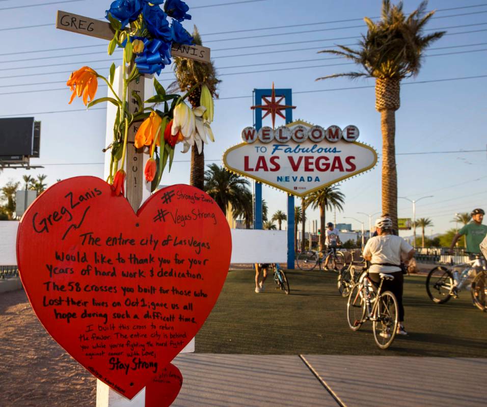 White crosses for Greg Zanis at the "Welcome to Fabulous Las Vegas" sign on Monday, M ...