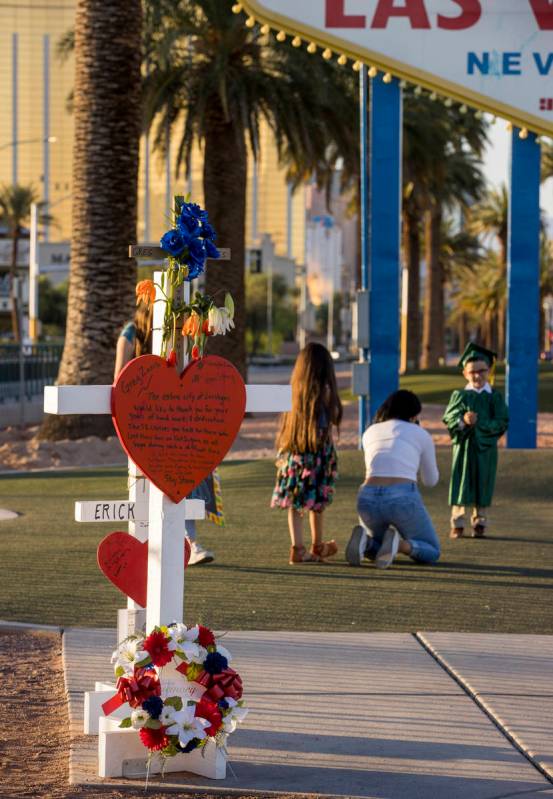 White crosses for Greg Zanis at the "Welcome to Fabulous Las Vegas" sign on Monday, M ...