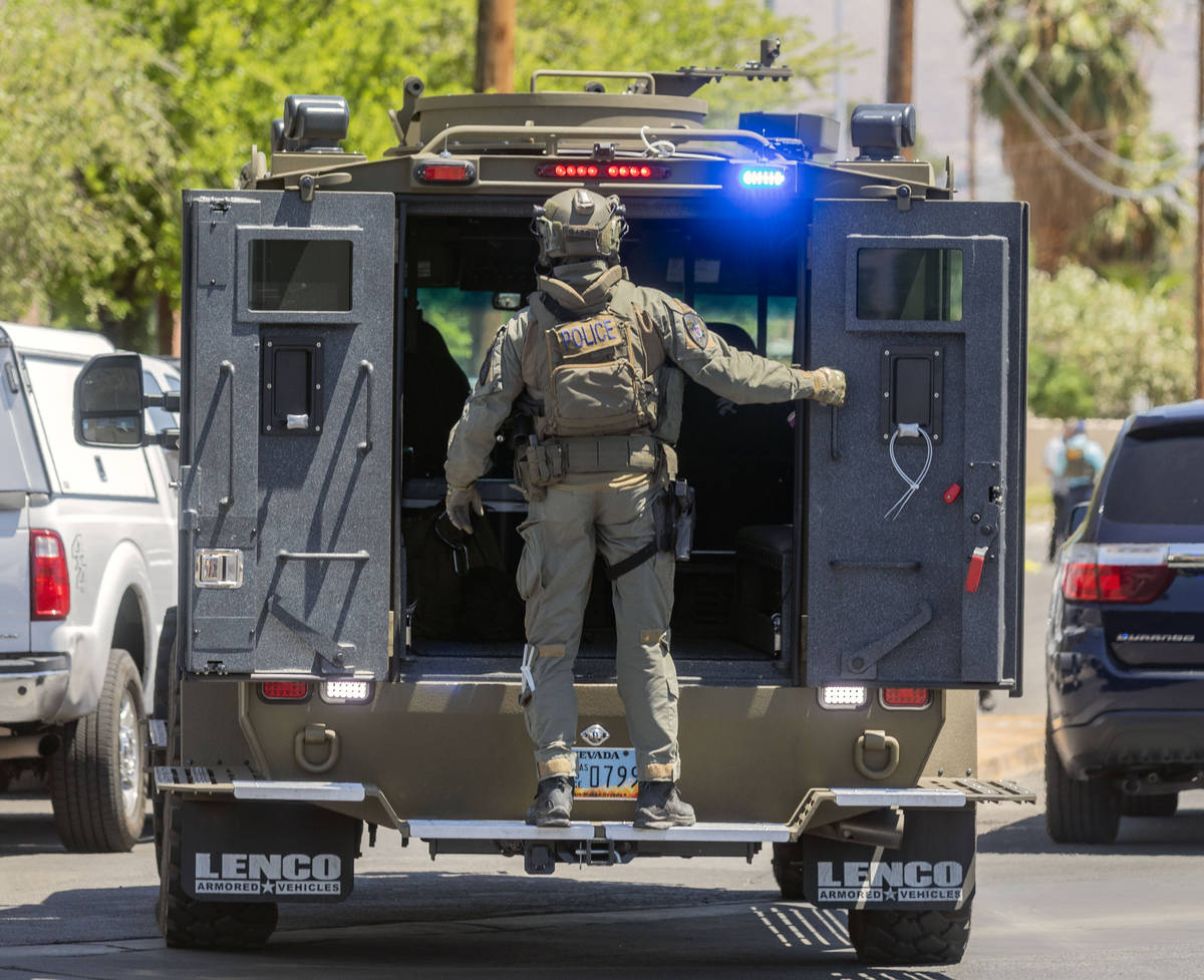 Las Vegas police investigate a downtown shooting in the 1900 block of Fremont Street in Las Veg ...