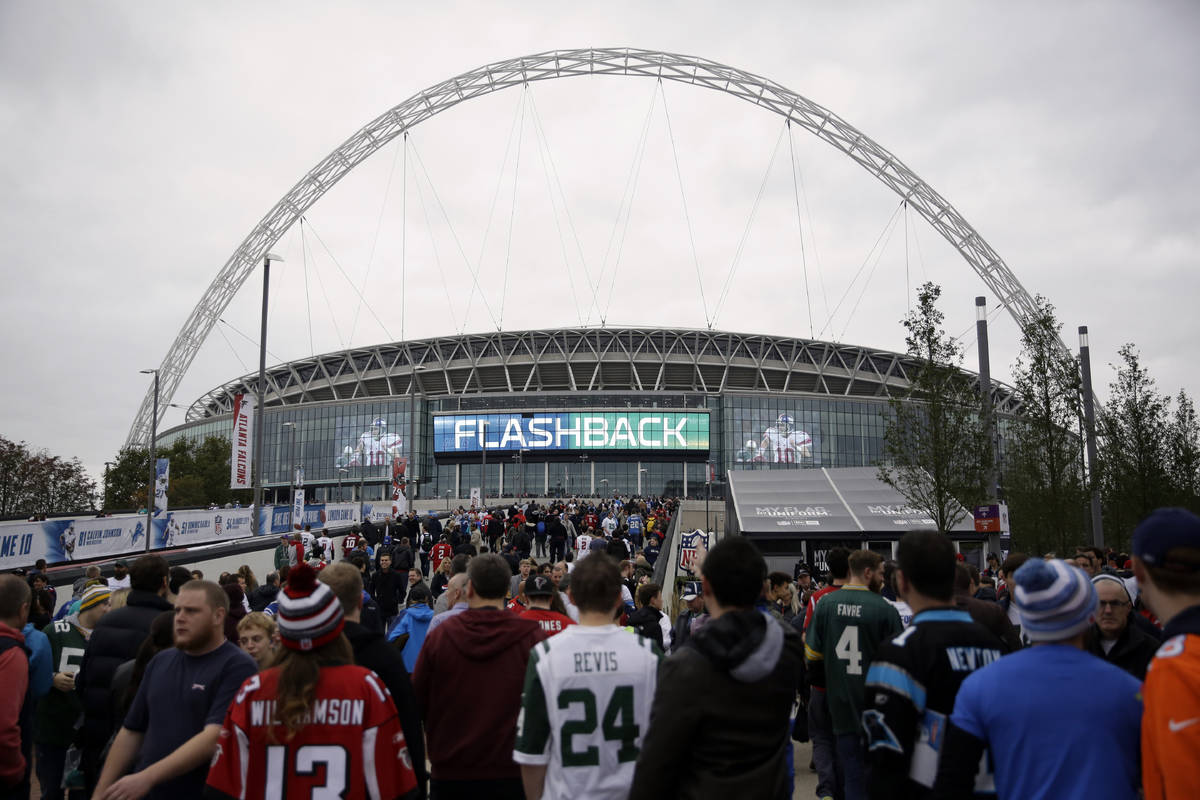 In this Oct. 26, 2014, file photo, sans arrive at Wembley Stadium before an NFL football game b ...