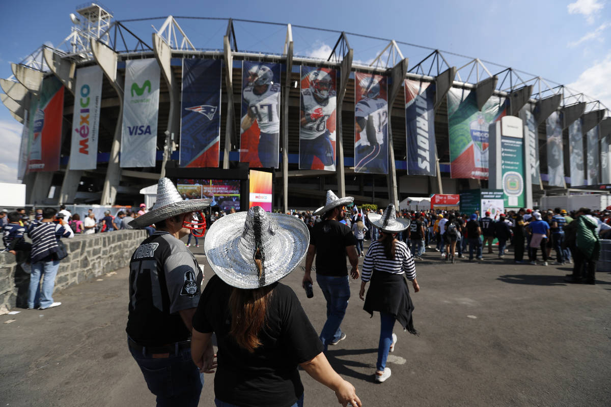 In this Nov. 19, 2017, file photo, fans arrive at Azteca stadium before an NFL football game be ...