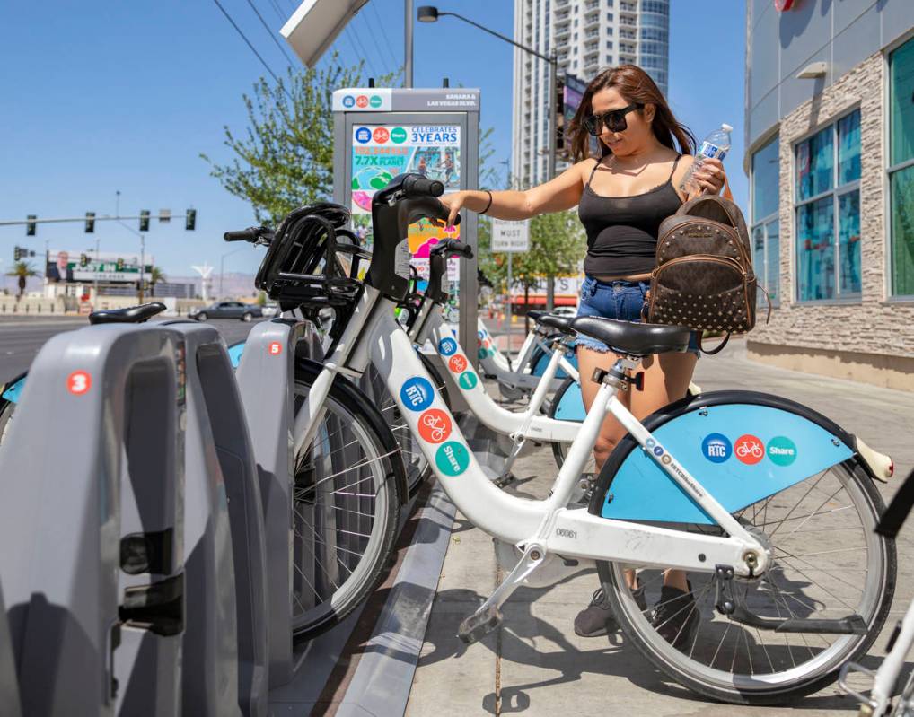 Maribel Leyva rents an RTC Bike Share from the East Sahara Ave., and Las Vegas Blvd., bike shar ...