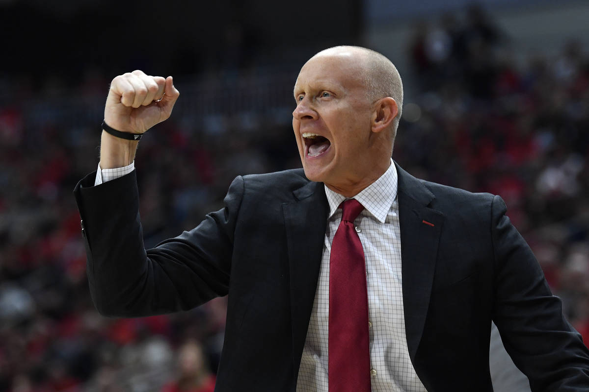 FILE - In this Dec. 6, 2019, file photo, Louisville head coach Chris Mack reacts to a play duri ...