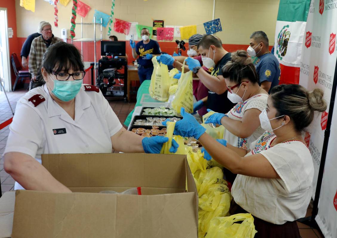 The Salvation Army Lieutenant Heather Baze, left and the staff of Viva Zapata's Mexican Restau ...