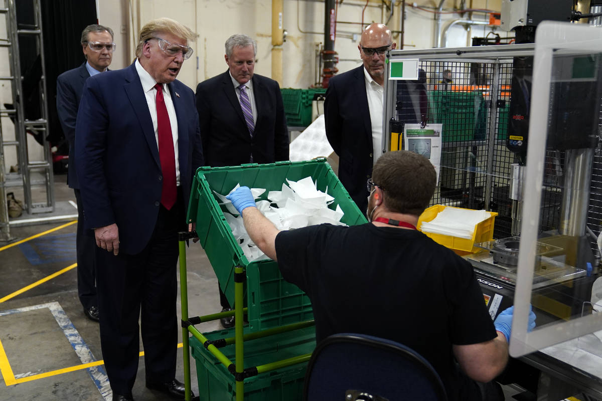 President Donald Trump participates in a tour of a Honeywell International plant that manufactu ...