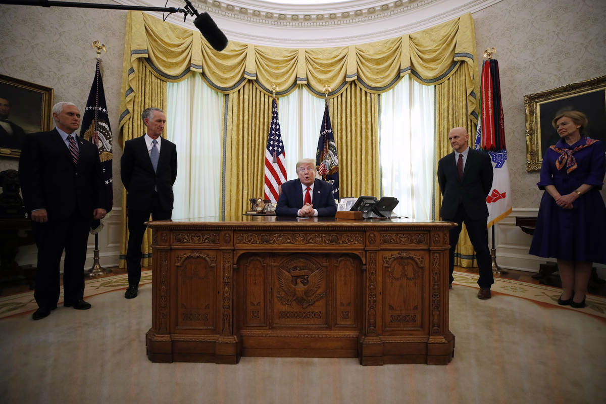 Vice President Mike Pence, Daniel O'Day, CEO of Gillead Sciences Inc., left, Stephen Hahn, comm ...