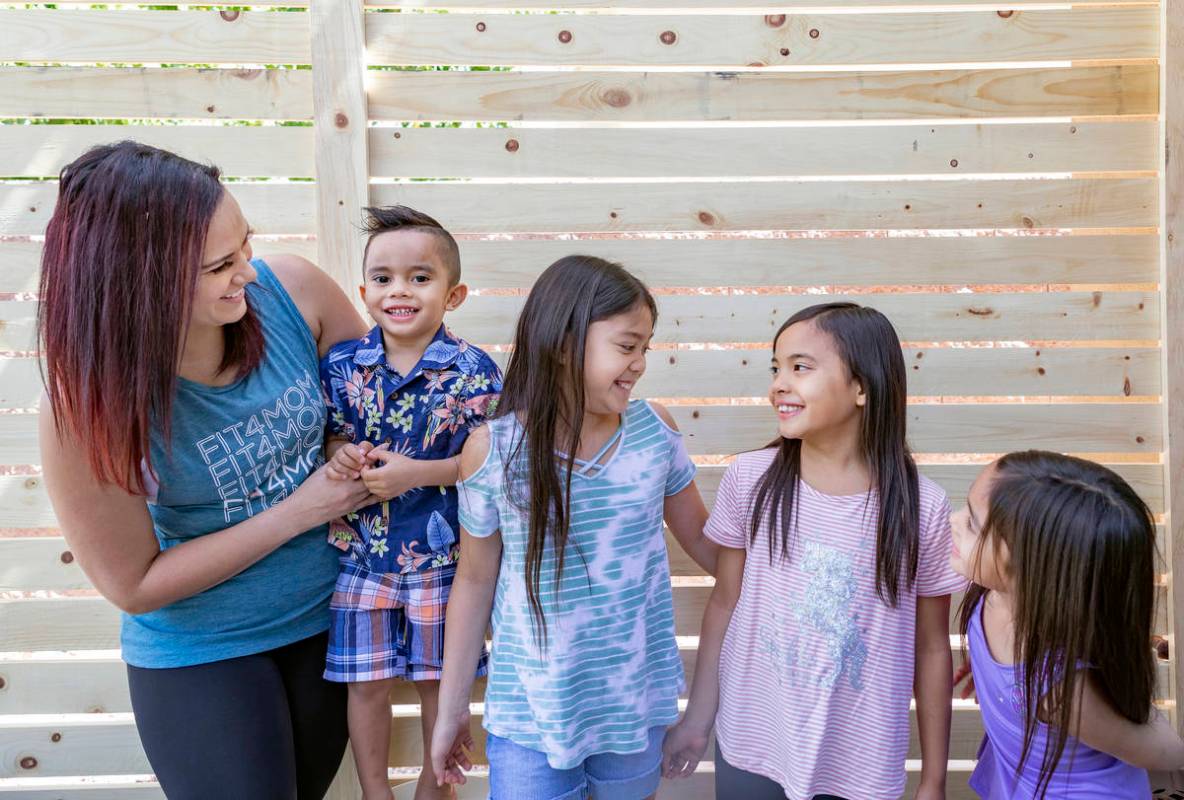 Owner of FIT4MOM Las Vegas Jessica Peralta is photographed with her four children, Giovanni, 3, ...