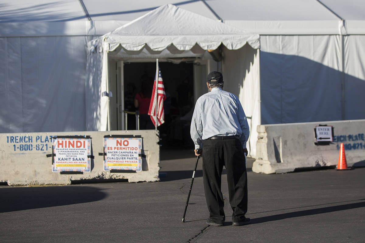 North West Las Vegas residents walk into the voting station at 7881 W. Tropical Pkwy. on Tuesda ...