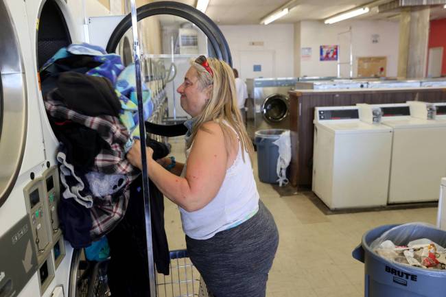 Michelle Fuller Hines at Emmy's Laundromat on East Main Street in Barstow Calif. Tuesday, May 5 ...
