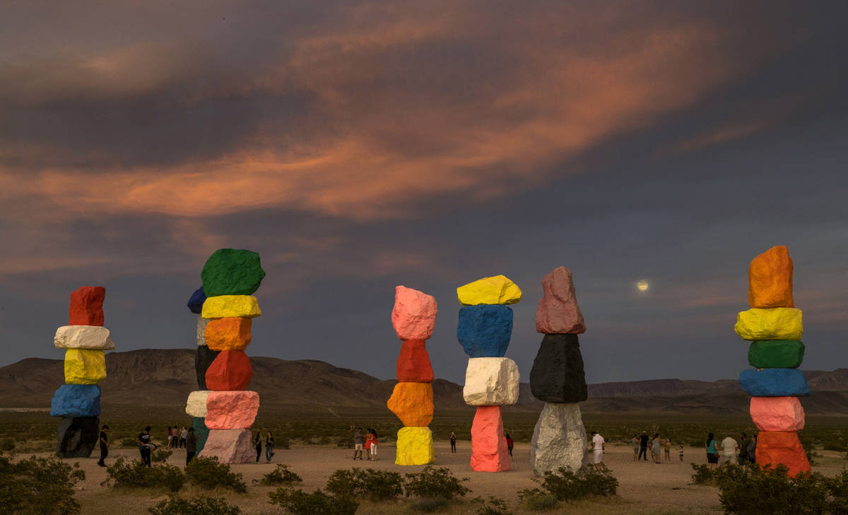 The moon rises over the Seven Magic Mountains outside Las Vegas on May 6, 2020. The full moon ...