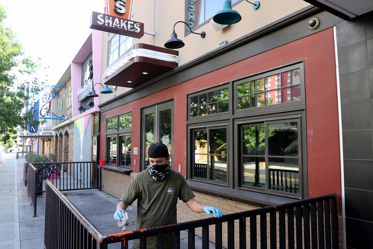 Ken Mattox, assistant manager at Flippin' Good Chicken, Burgers, Beer on East Fremont Street in ...