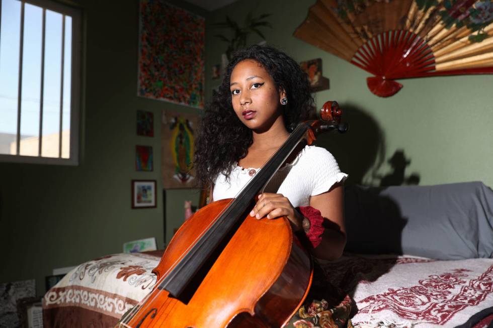 Orchestra teacher Coco Jenkins Thomas poses for a photo at her home in Las Vegas, Thursday, May ...