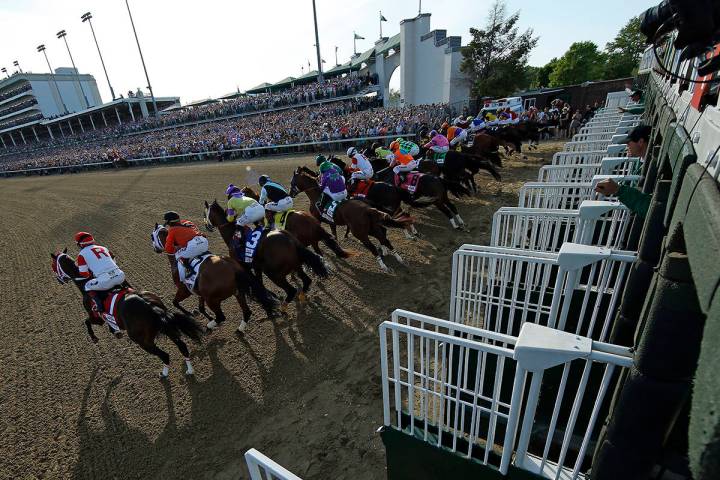 FILE - In this May 3, 2014, file photo, the field breaks from the starting gate during the 140t ...