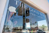 Erik Cerza, owner of I Love Windows cleaning company, cleans the windows at the Good Wolf Lifes ...