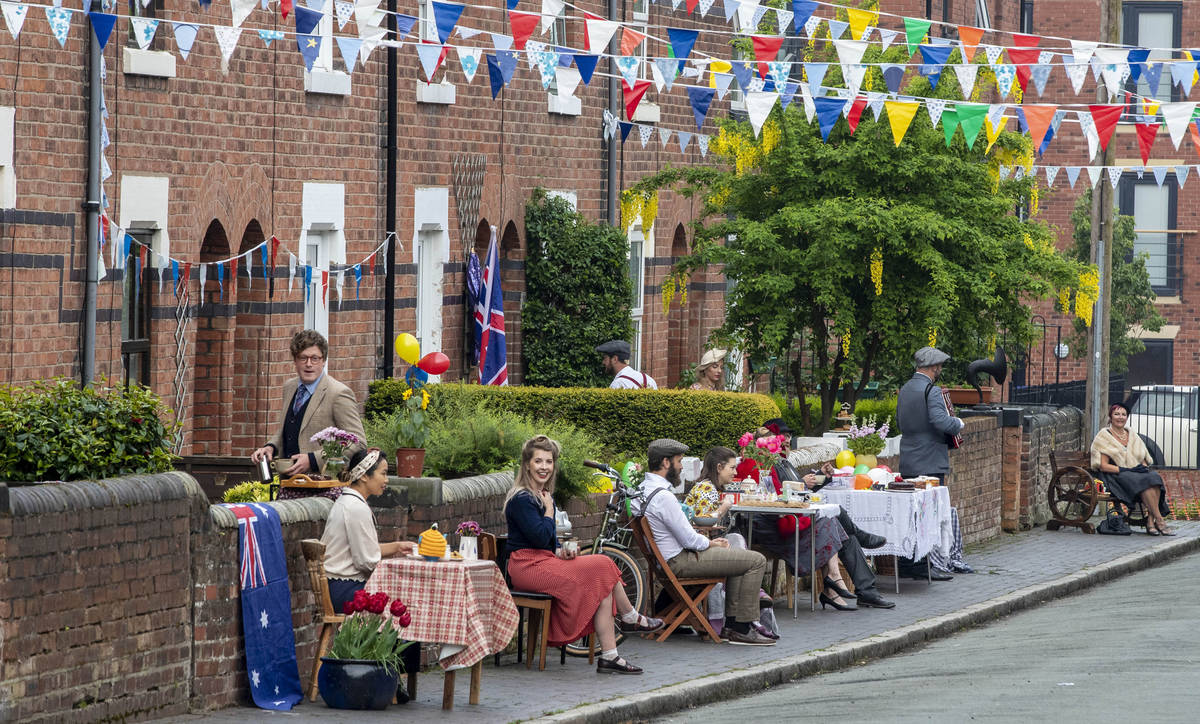 The residents of Cambrian Road in Chester dress up in 1945 clothing and have a social distancin ...