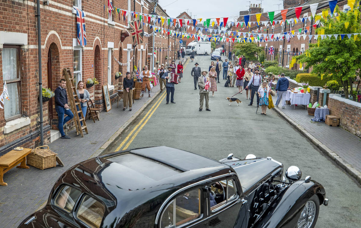 The residents of Cambrian Road in Chester dress up in 1945 clothing and have a social distancin ...