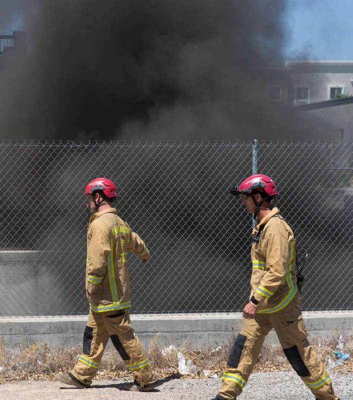 Henderson firefighters are investigating a fire in a storm drain that generated a large amount ...