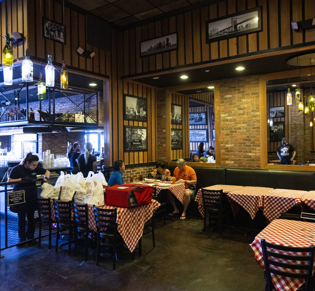 People dine at Grimaldi's in Boca Park as some restaurants open for table-service in Las Vegas ...