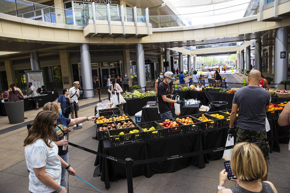 People stop by the Las Vegas Farmers Market at Downtown Summerlin in Las Vegas on Saturday, May ...
